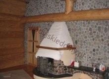 Wnętrza domów z bali - Kominki